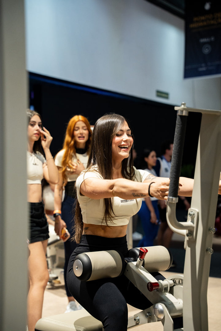 Athlete gripping the support handles on the Gluteleader Standing Hip Thrust GL-1004